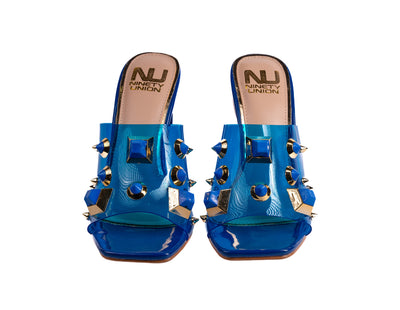 Ninety Union Vegas Lucite Multicolor Stone Slide On a Gold Circular Heel